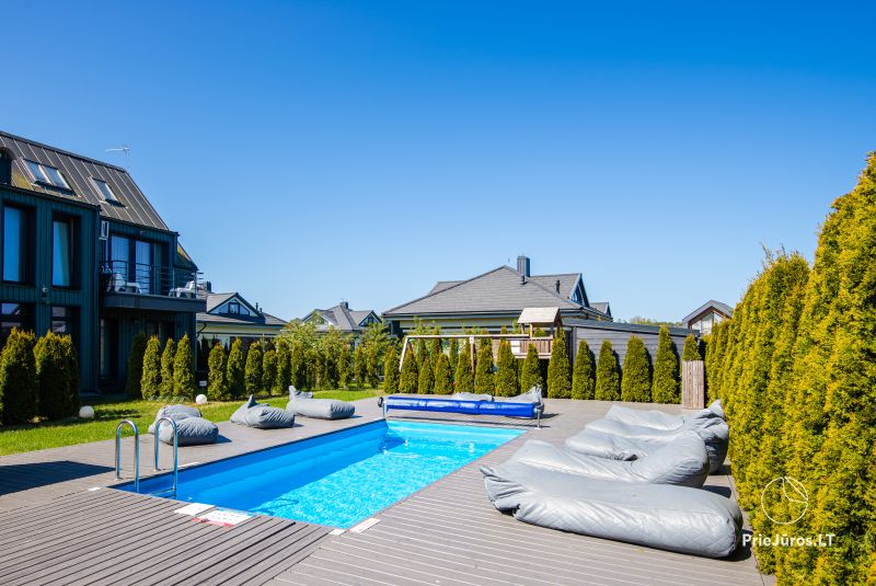 Two-story apartment with heated outdoor pool