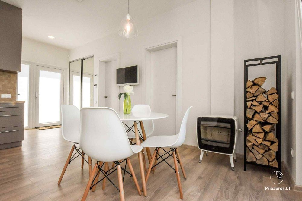 House rental in Kunigiškės with terrace and hot tub.