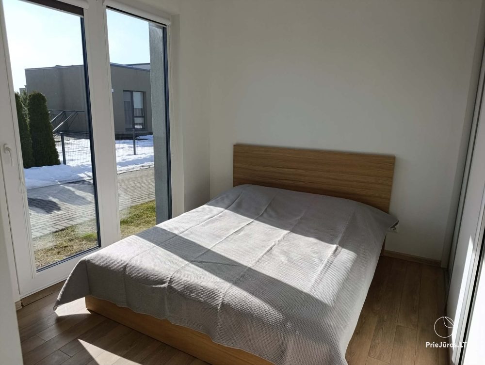 House rental in Kunigiškės with terrace and hot tub.