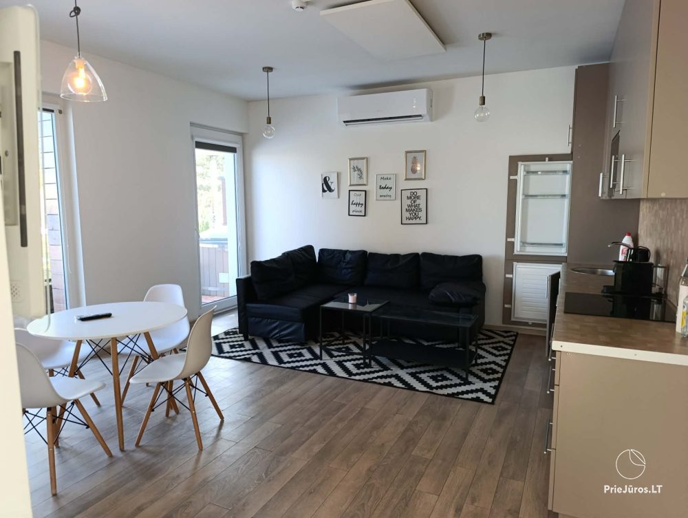 House rental in Kunigiškės with terrace and hot tub.