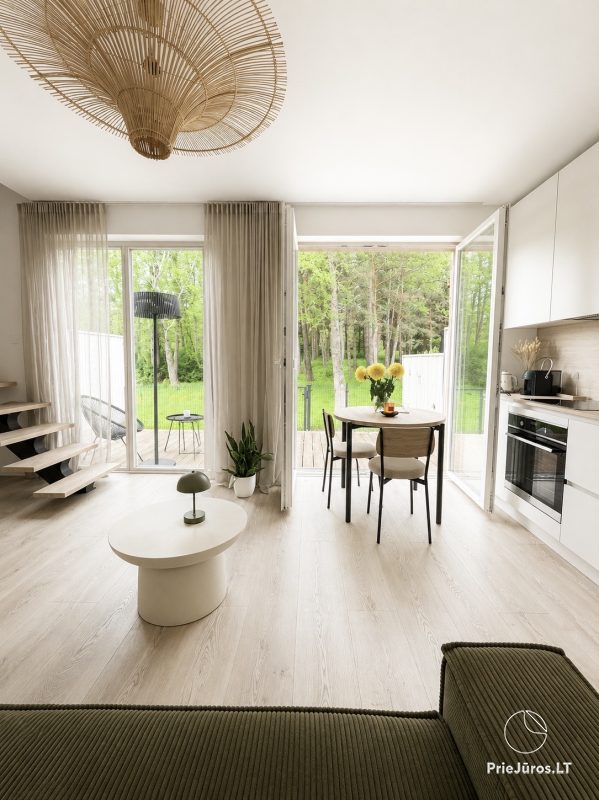 Cottage in Monciškės. 150 m from the sea with a view to a grove. Barefoot by the Sea.