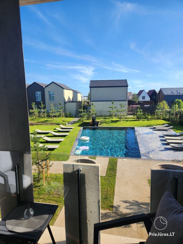 Cozy apartments for two with a balcony and pool view