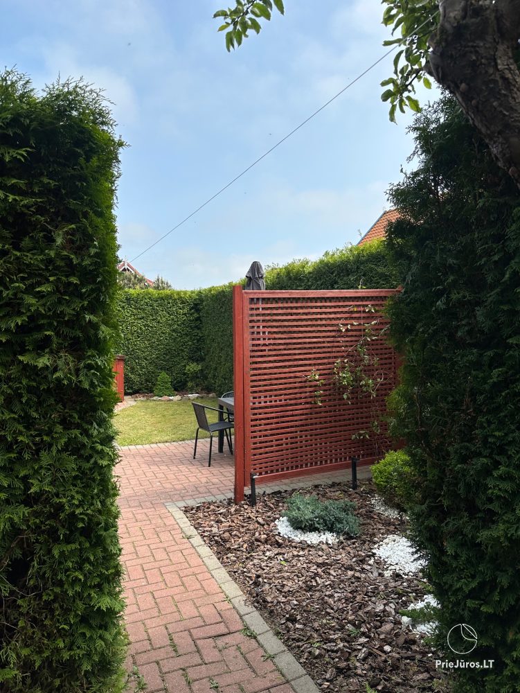 Two rooms apartment in the center of Nida with private garden