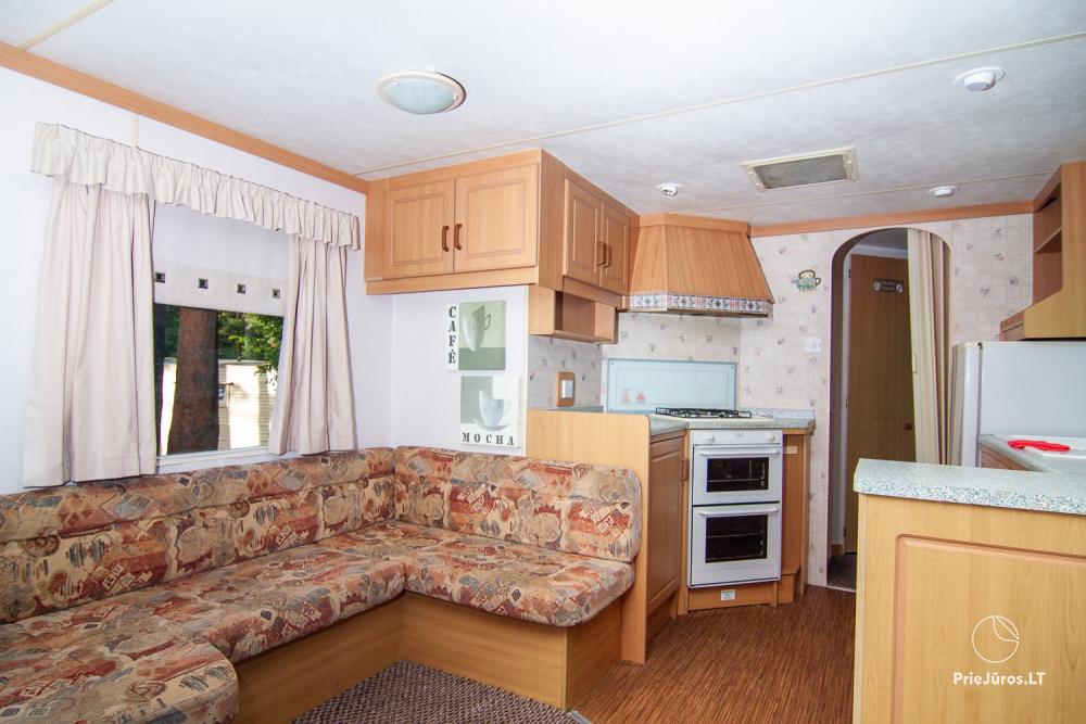 Little holiday houses with conveniences for rent in Sventoji