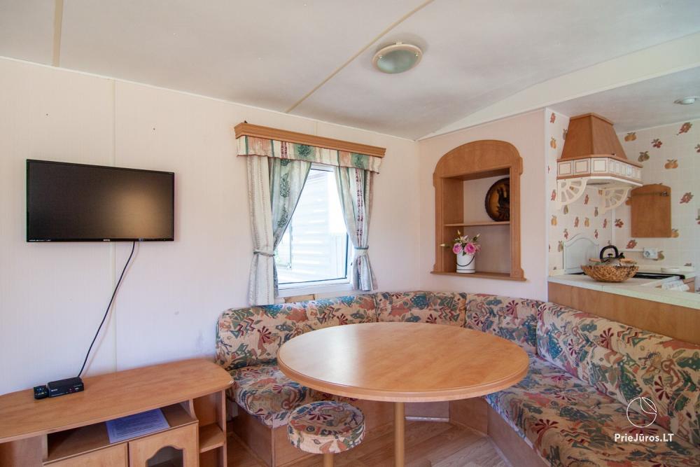 Little holiday houses with conveniences for rent in Sventoji
