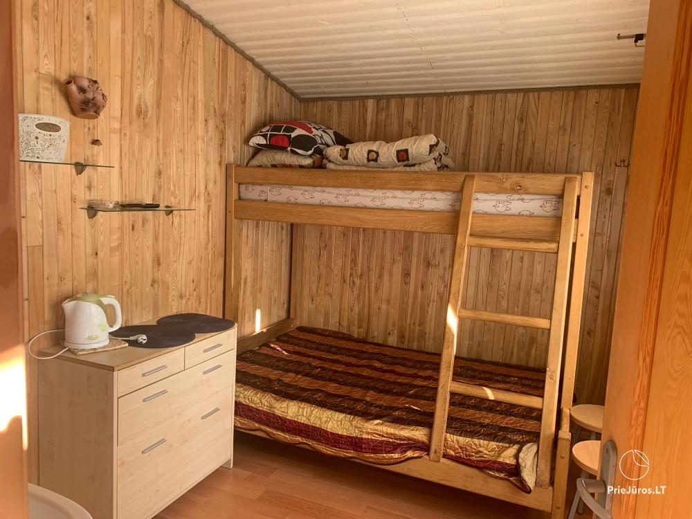 Angleras.lt. Комнаты в домиках в Швянтойи