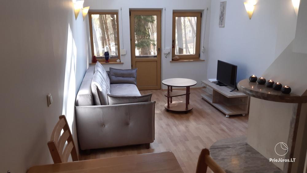 Cottage for rent in Nida with balcony, fireplace, Wi-Fi, free parking
