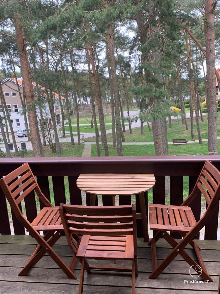 Cottage for rent in Nida with balcony, fireplace, Wi-Fi, free parking