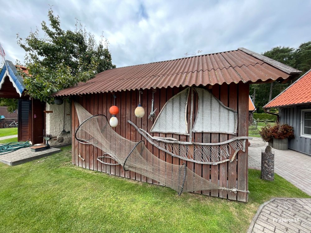Preila 91 - Rooms for rent in Preila. An arbor in the yeard with the view to the lagoon!