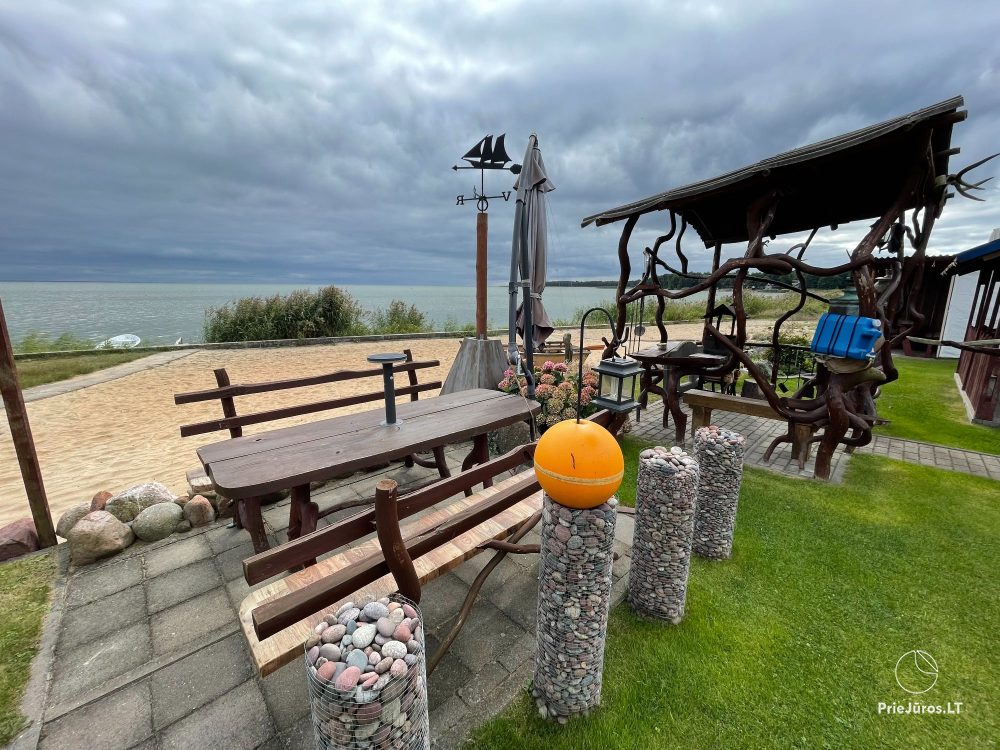 Preila 91 - Rooms for rent in Preila. An arbor in the yeard with the view to the lagoon!