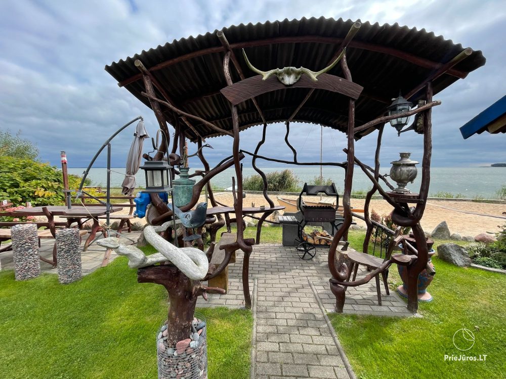 Preila 91 - Rooms for rent in Preila. An arbor in the yeard with the view to the lagoon!