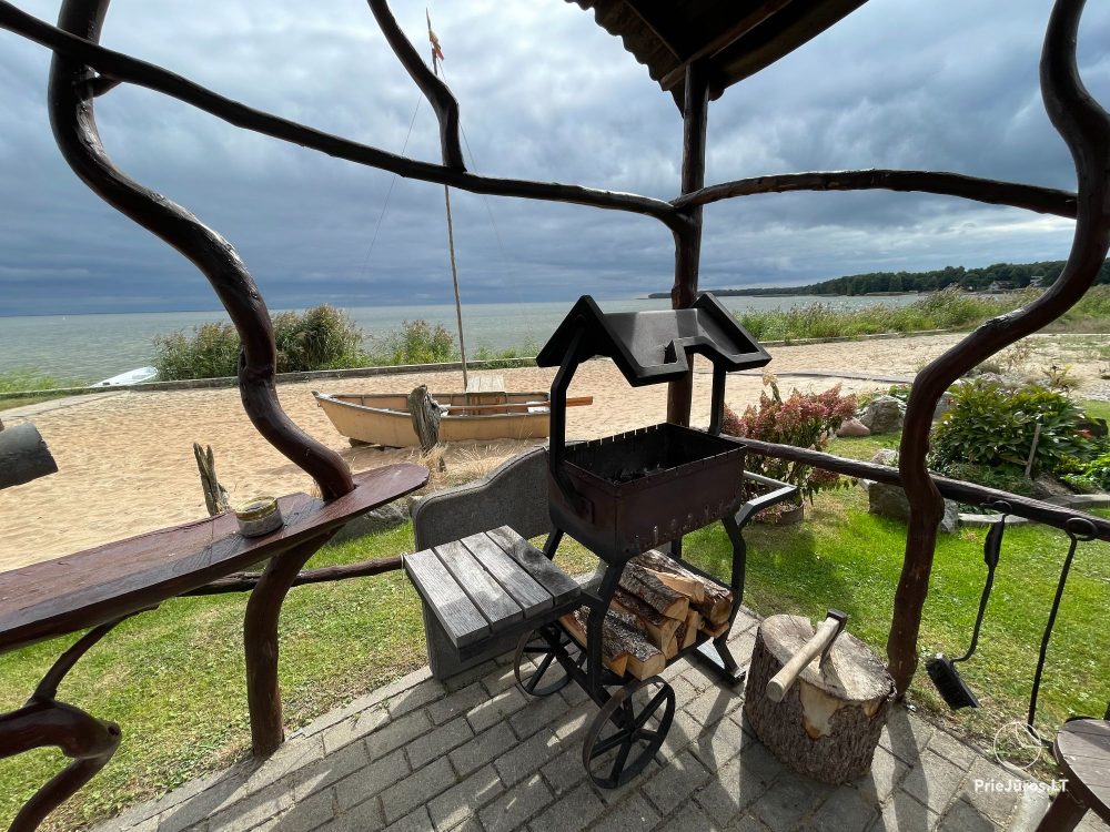 Preila 91 - Rooms for rent in Preila. An arbor in the yeard with the view to the lagoon!