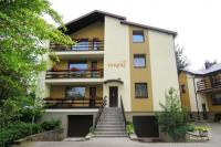 Accommodation in Palanga villa "Vakare". In the yard: summerhouses with outdoor furniture