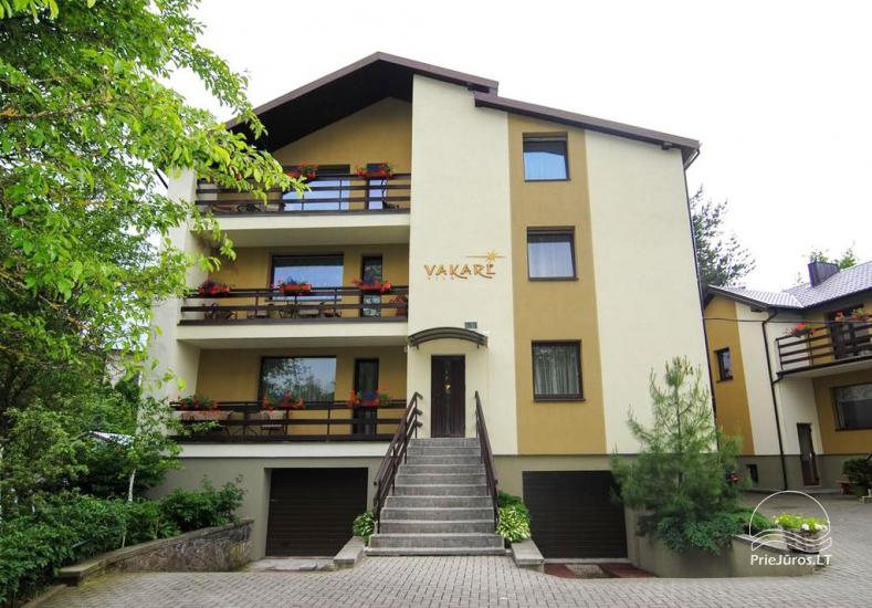 Accommodation in Palanga villa VAKARE. In the yard: summerhouses with outdoor furniture, playground for kids - 1