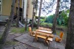 Accommodation in Palanga villa VAKARE. In the yard: summerhouses with outdoor furniture, playground for kids - 6