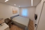 Stylish apartment with a private yard and a cozy house overlooking the lagoon for rent in Preila