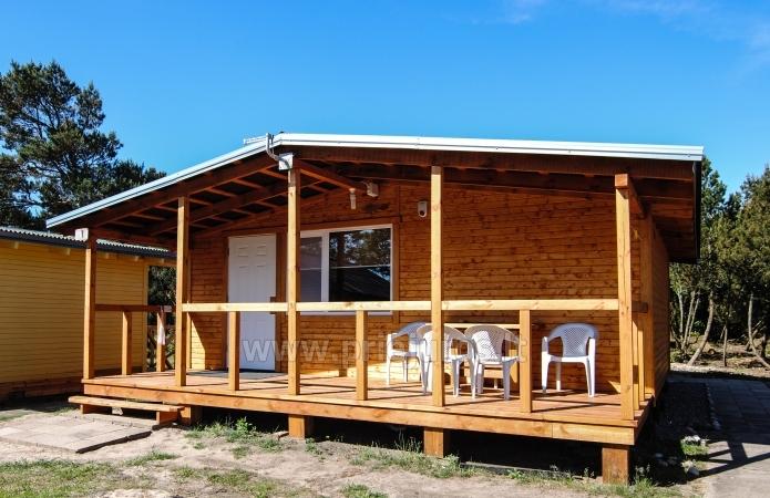 Cabins by the sea in the dunes