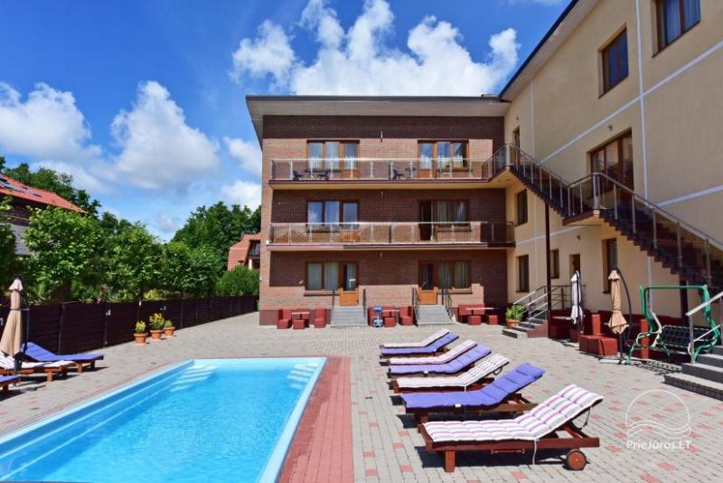 IEVŲ VILA in Palanga – comfortable apartments and rooms, wide yard, heated swimming pool