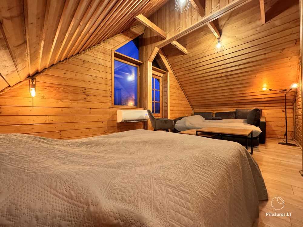 Guest house PAMARIO BURĖ near the Curonian lagoon. Restaurant, sauna, campsite.