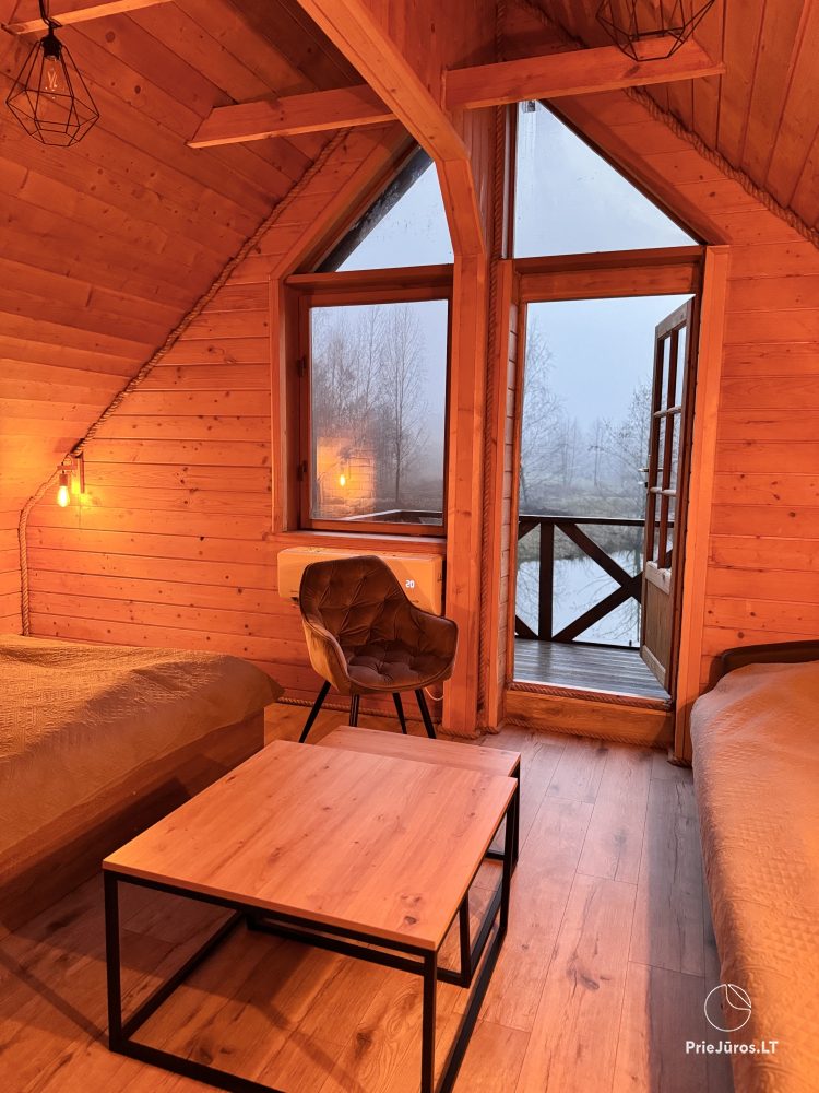 Guest house PAMARIO BURĖ near the Curonian lagoon. Restaurant, sauna, campsite.