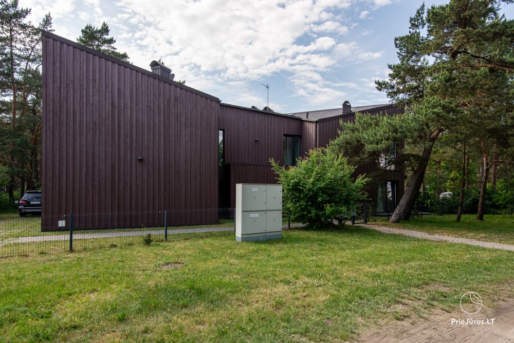 Apartments in Kunigiškiai. Terrace with a view of a pine forest, 200 m from the sea