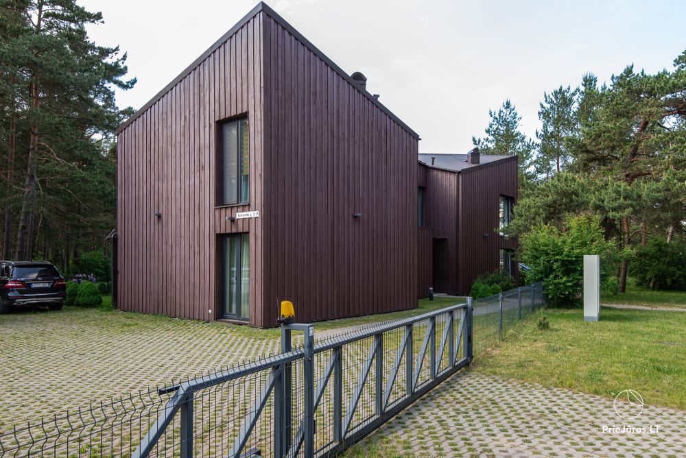 Apartments in Kunigiškiai. Terrace with a view of a pine forest, 200 m from the sea