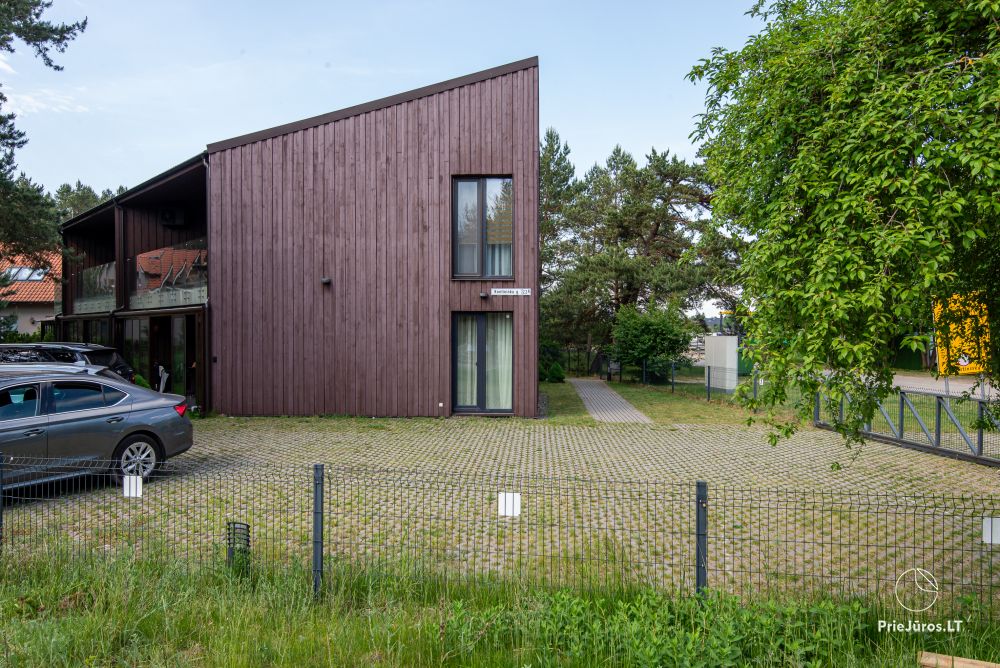 Apartments in Kunigiškiai. Terrace with a view of a pine forest, 200 m from the sea