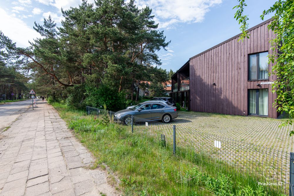 Apartments in Kunigiškiai. Terrace with a view of a pine forest, 200 m from the sea