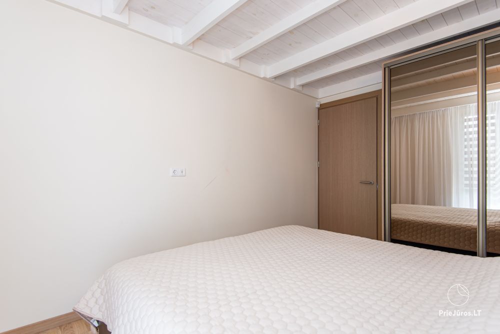 Apartments in Kunigiškiai. Terrace with a view of a pine forest, 200 m from the sea