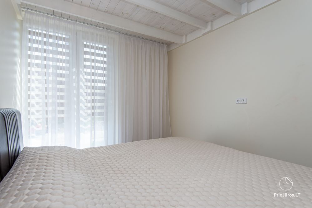 Apartments in Kunigiškiai. Terrace with a view of a pine forest, 200 m from the sea