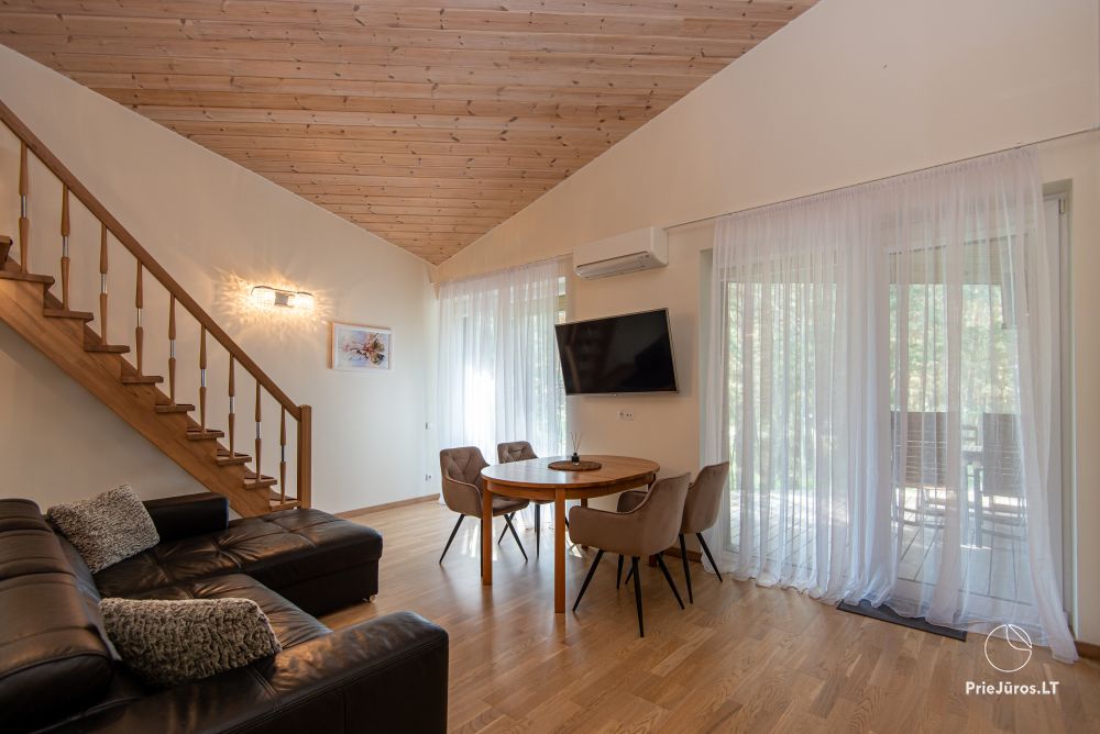 Apartments in Kunigiškiai. Terrace with a view of a pine forest, 200 m from the sea