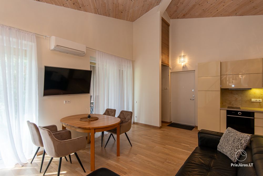 Apartments in Kunigiškiai. Terrace with a view of a pine forest, 200 m from the sea