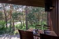Apartments in Kunigiškiai. Terrace with a view of a pine forest, 200 m from the sea