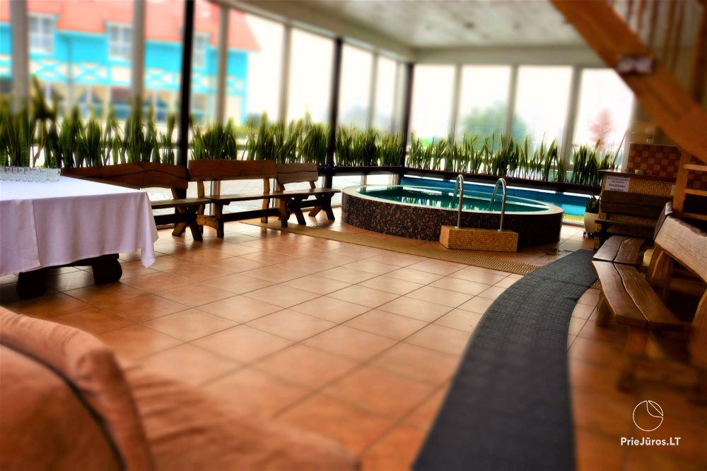Bathhouse with hall, heated swimming-pool, rooms for stay in homestead near Klaipeda region "Zupe"
