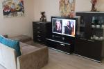 Modern apartment in the center of Palanga: private lawn with terrace and outdoor furniture