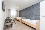 No. 3 Room with three single beds and a separate bathroom on the ground floor. - 2