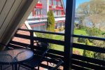 3. Quadruple room on the second floor with a view of the lagoon and a balcony