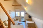 4. Four-person room on the second floor with a view of the lagoon and a balcony