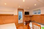 No. 3 Double room (0) in the basement with a sepasate entrance from the yard and a place in the courtyard with outdoor furniture